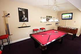 Internal Game Room with Olhausen pool table, foosball table, 42 inch flat screen TV, XBox 360 and board games