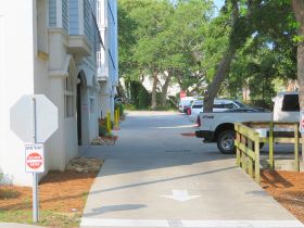 Villas access road exit, parking on right