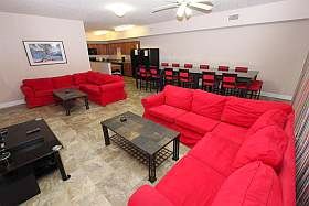 Living area showing kitchen in background